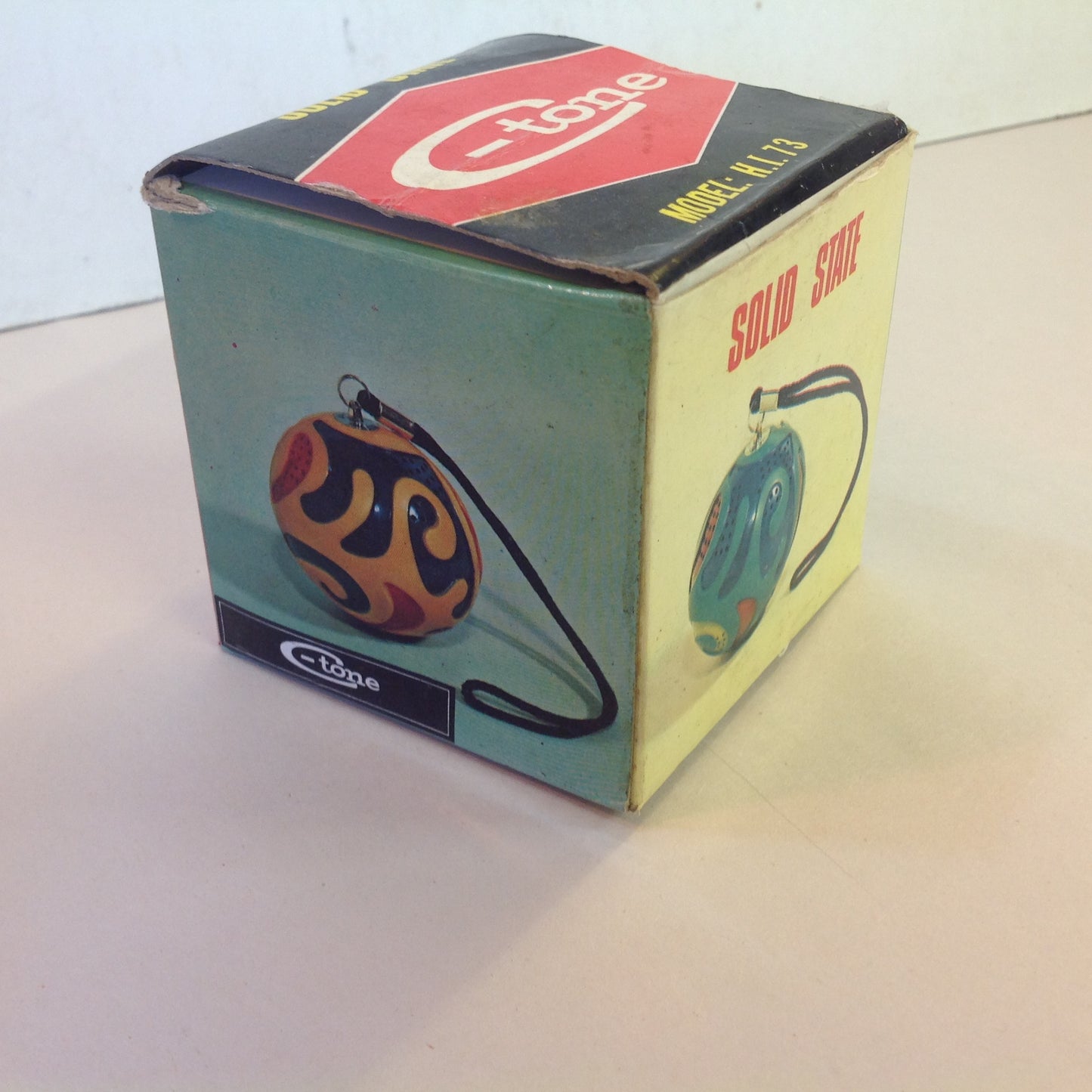 Vintage Solid State C-Tone Model H.I. 73 High Quality Unbreakable Micro Radio Yellow Globe w/Chain and Box Hong Kong