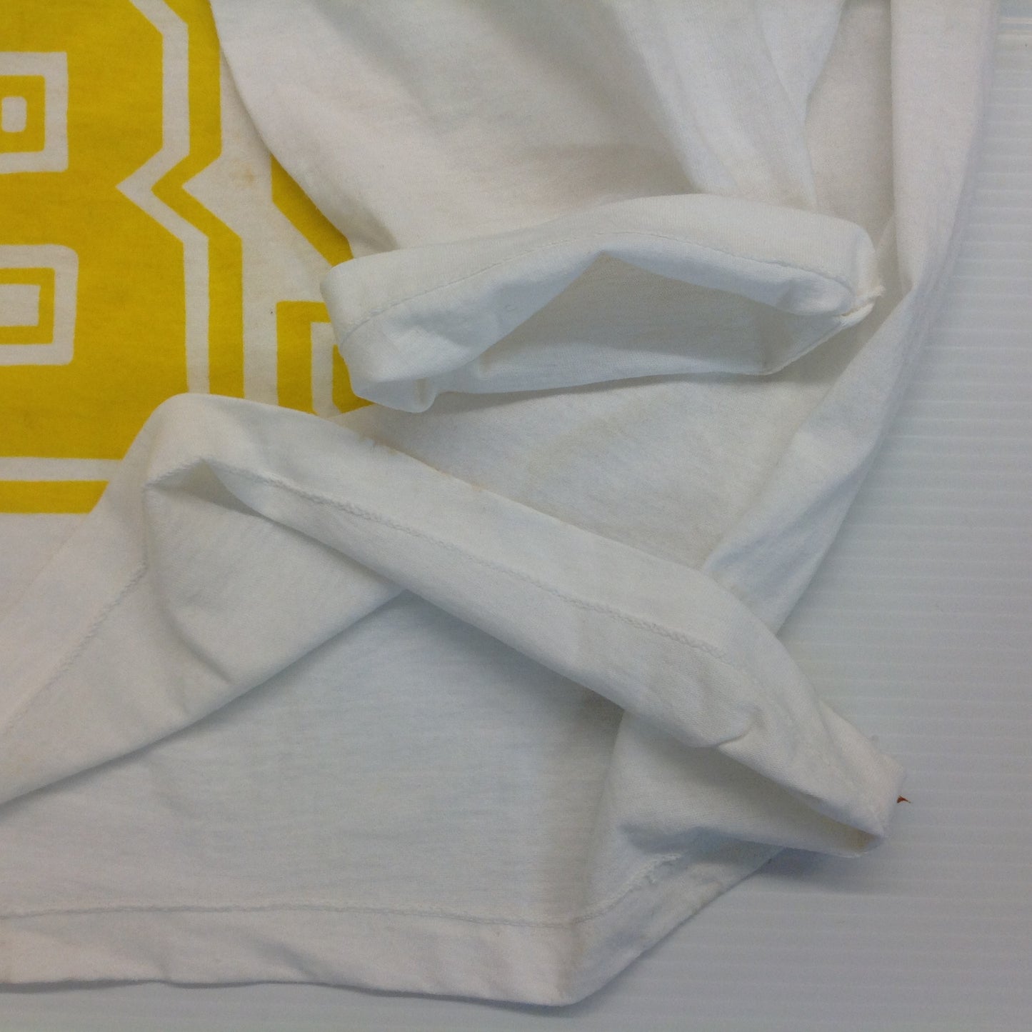 Vintage 1980's Novelty T-Shirt STAYING ALIVE IN 85 Yellow on White Katharine Hamnett