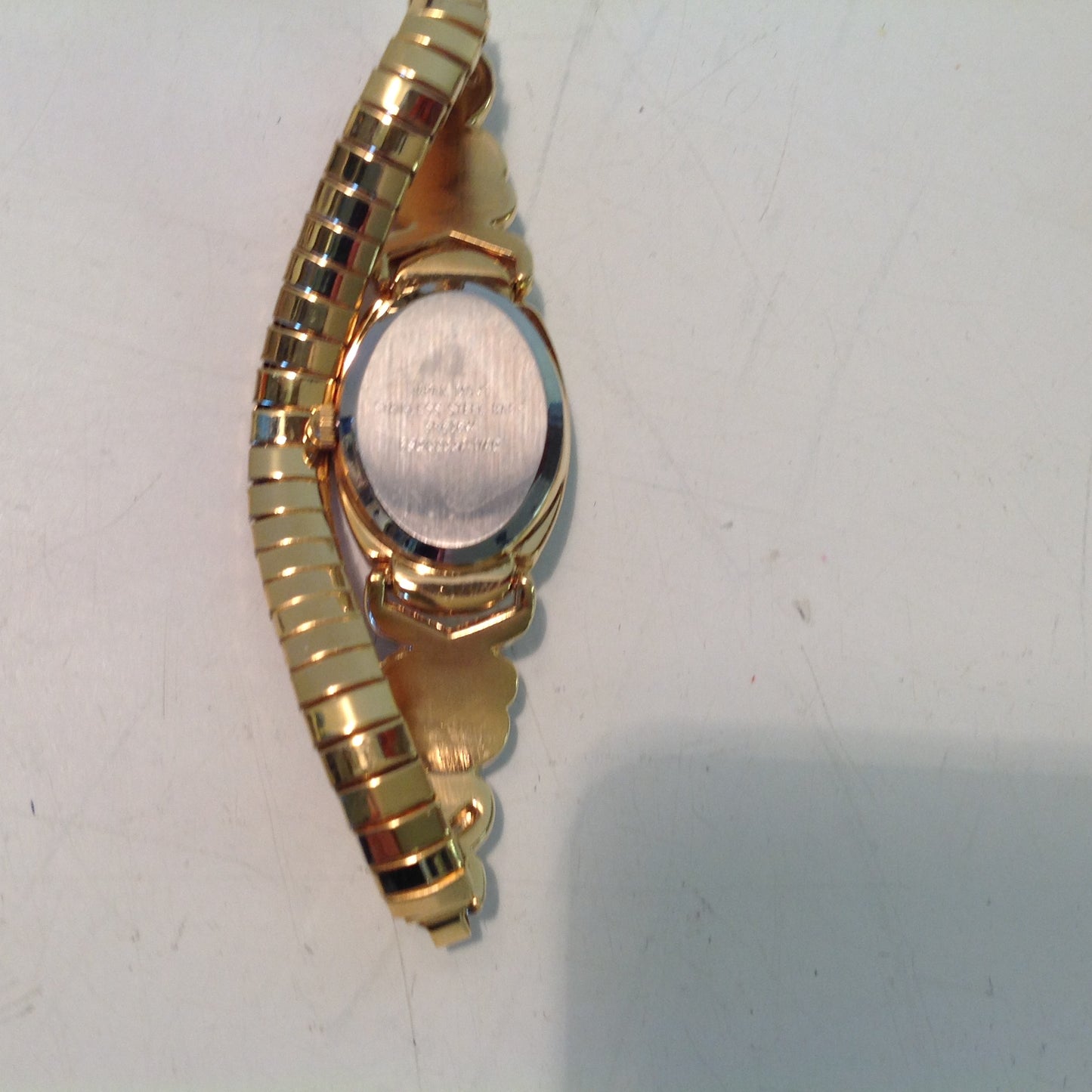 2004 NOS AVON Women's Small Goldtone Pearlesque Accent Cuff to Stretch Watch/Box