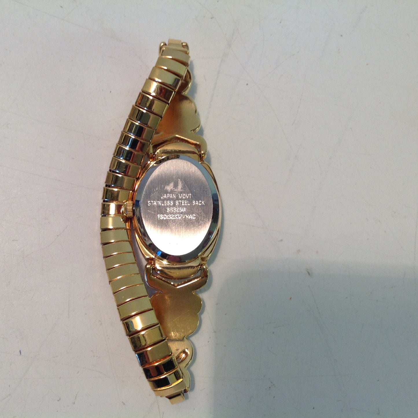 2004 NOS AVON Women's Small Goldtone Pearlesque Accent Cuff to Stretch Watch/Box