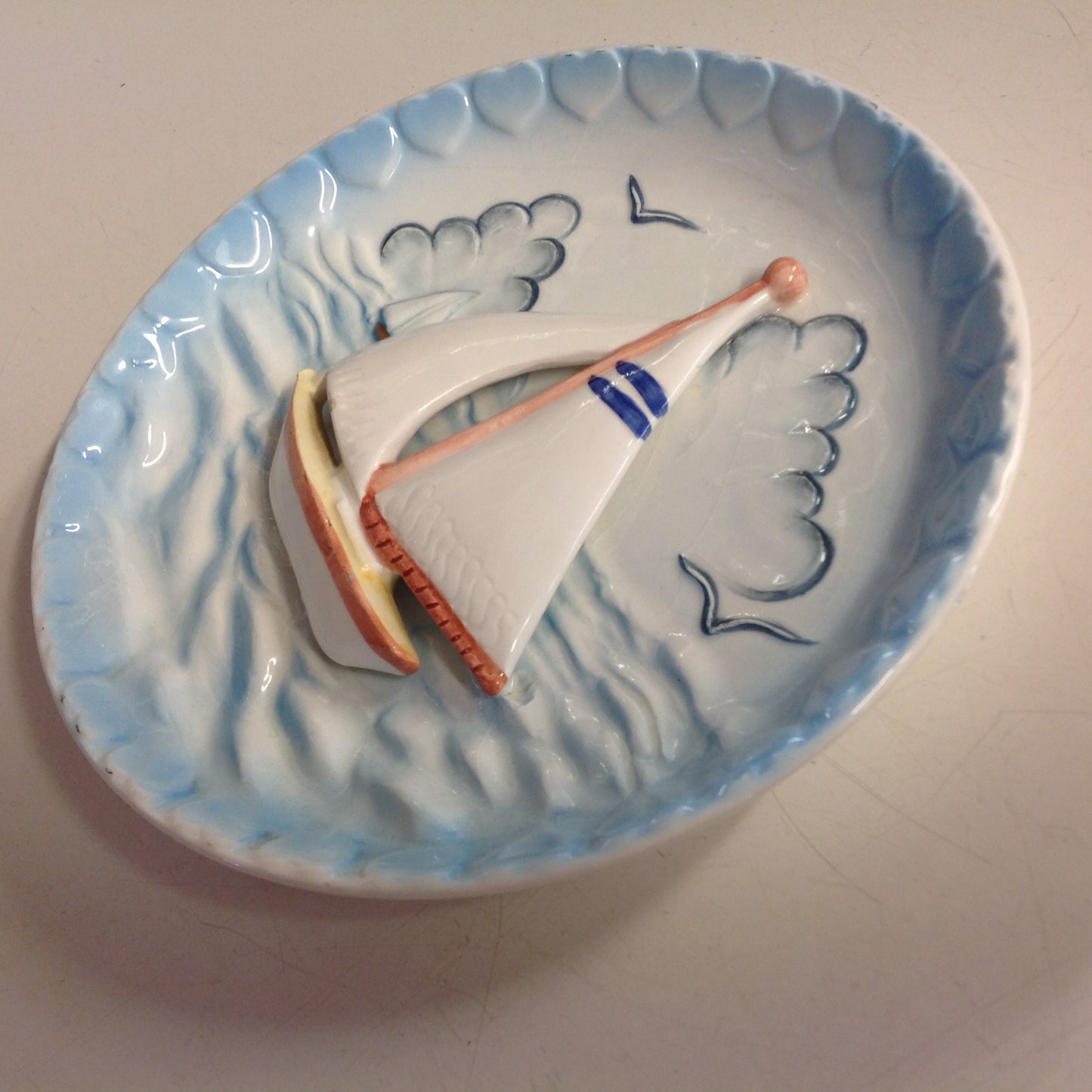 Vintage Ceramic Wall Hanging Plate Sailboat Scene in Relief with Sculpted Waves