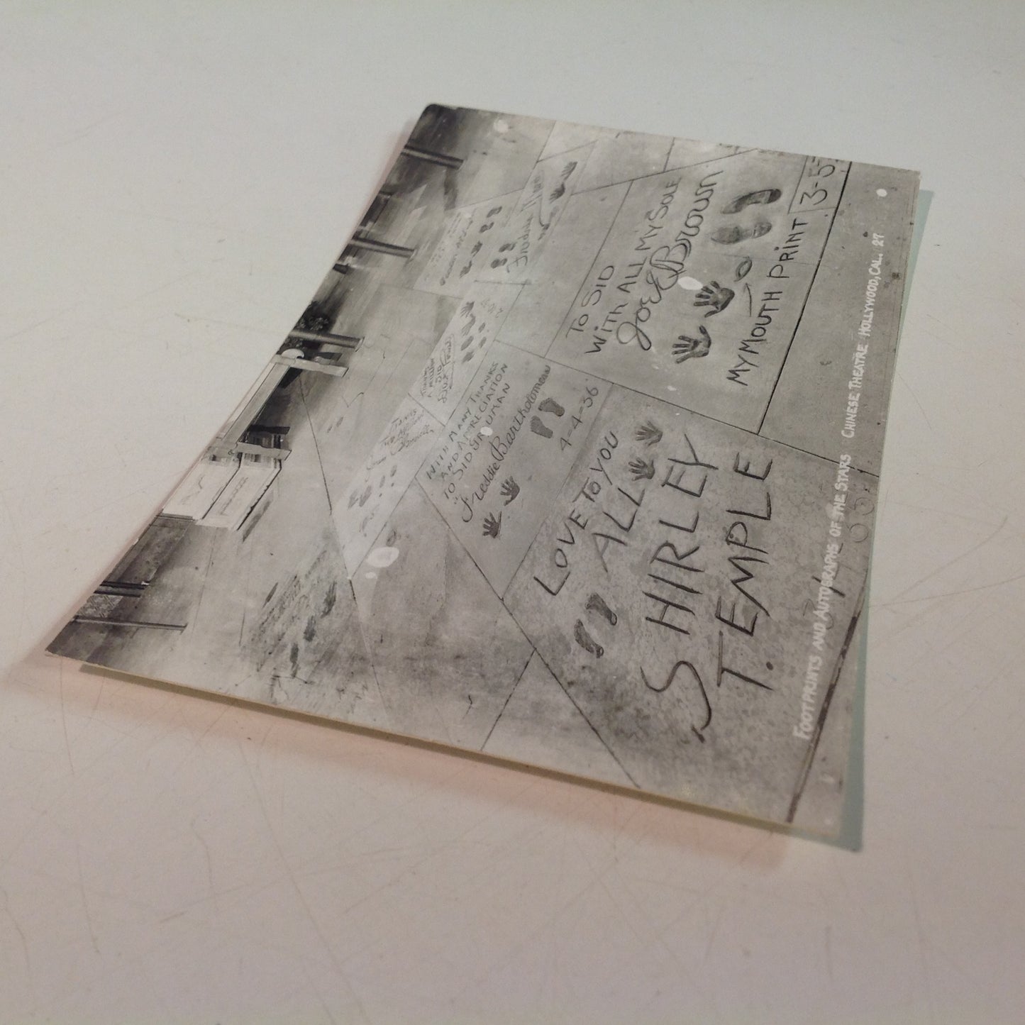 Vintage Souvenir B&W Real Photo Postcard Footprints and Autographs of the Stars Chinese Theatre Hollywood California