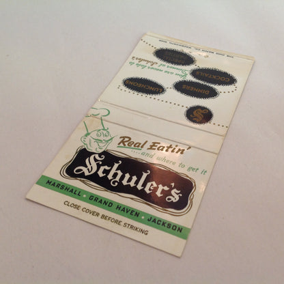Vintage Matchbook Cover Schuler's Real Eatin' Marshall Grand Haven Jackson Michigan
