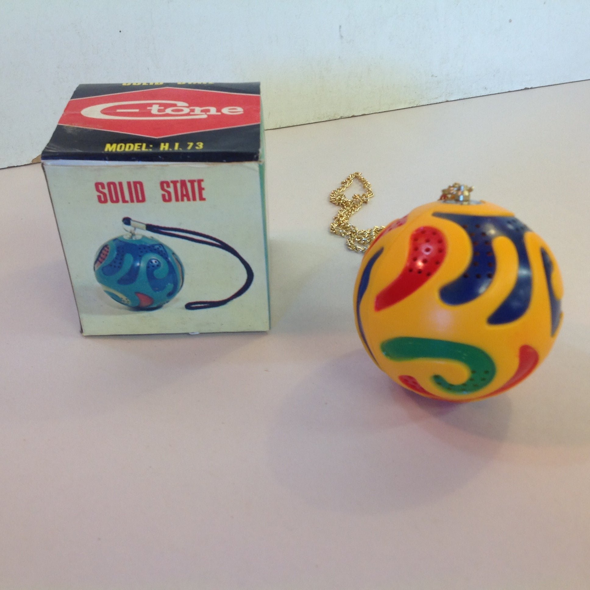 Vintage Solid State C-Tone Model H.I. 73 High Quality Unbreakable Micro Radio Yellow Globe w/Chain and Box Hong Kong