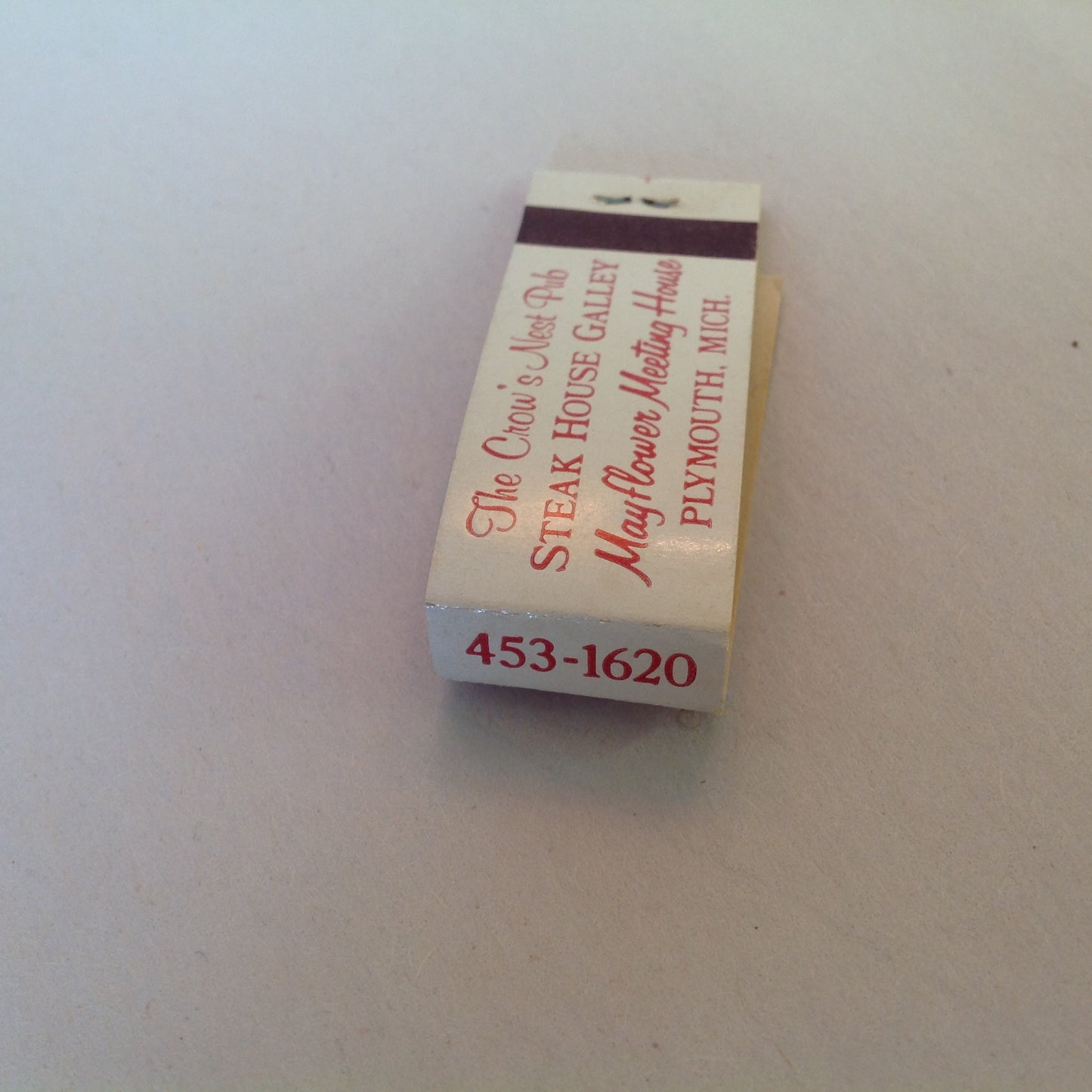 Vintage Souvenir Midget Matchbook Mayflower Hotel Crow's Nest Pub Plymouth Michigan