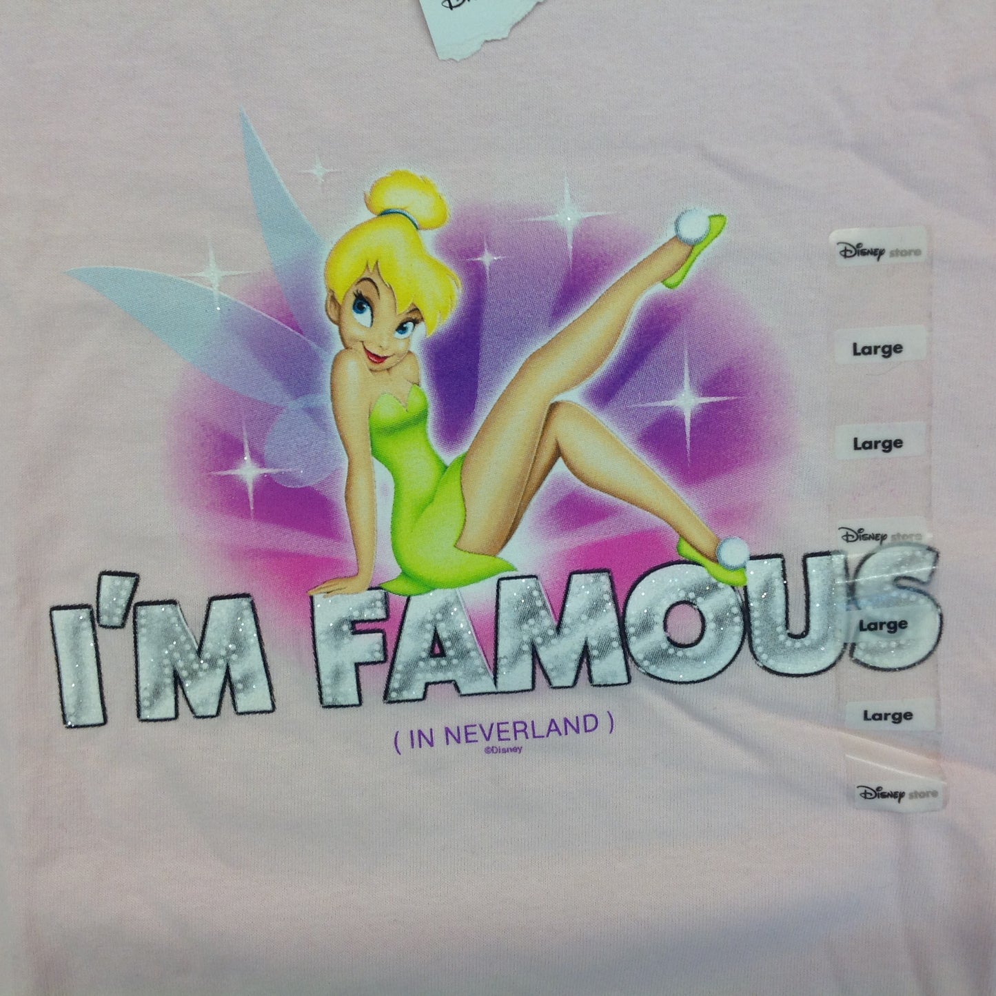 Large Disney Store Pink T-Shirt Glittery TinkerBell I'm Famous in Neverland New with Tag