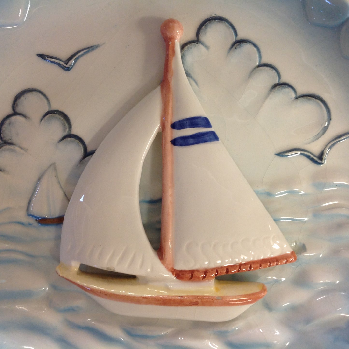 Vintage Ceramic Wall Hanging Plate Sailboat Scene in Relief with Sculpted Waves