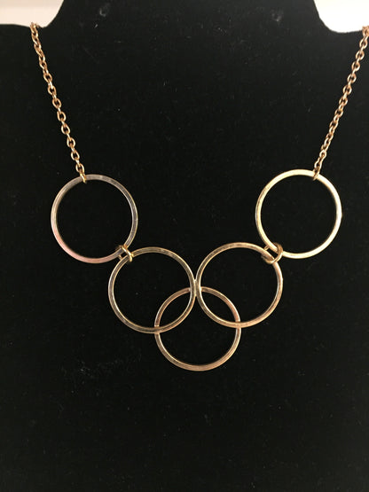 Vintage Designer Avon Goldtone Interlocking Circle Necklace Simple Yet Elegant