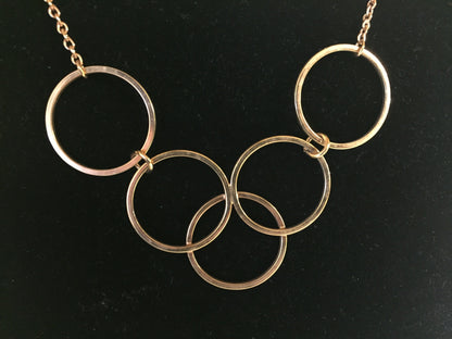 Vintage Designer Avon Goldtone Interlocking Circle Necklace Simple Yet Elegant